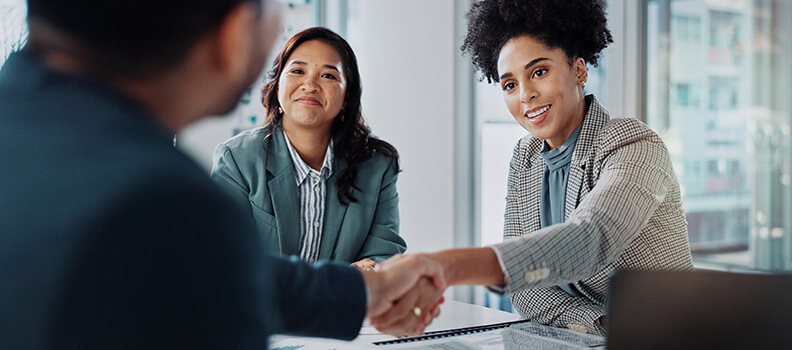 Business people shaking hands